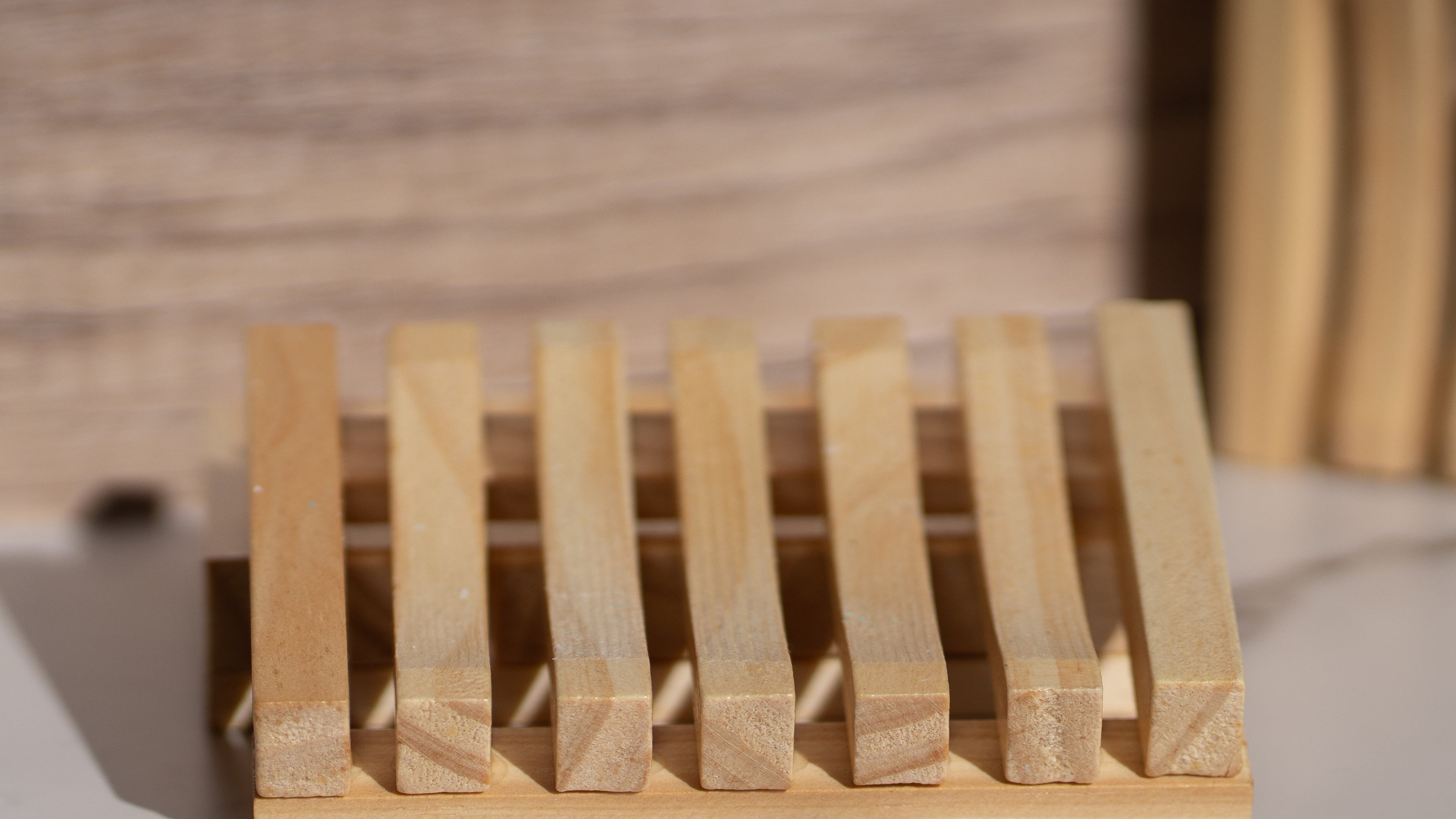 Eco-friendly wooden soap dish with a Cloudy Soap handmade bar